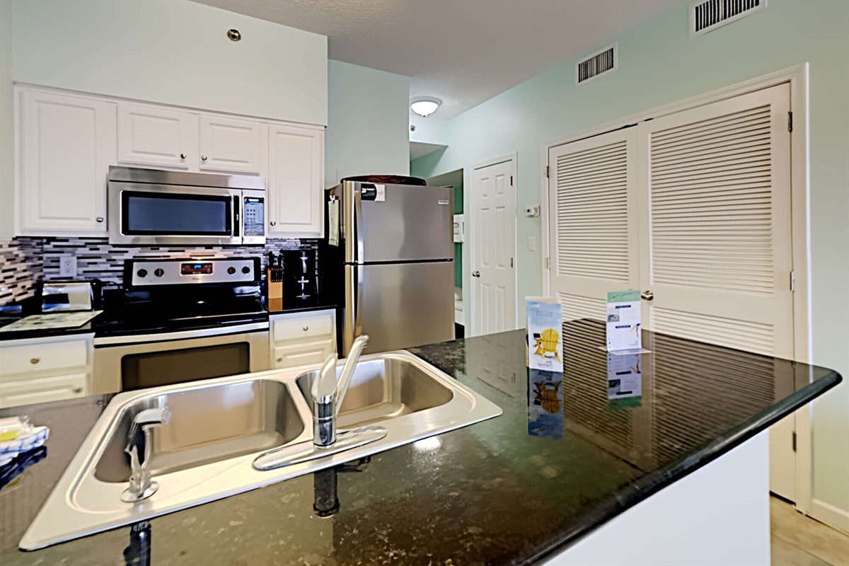 Kitchen with stainless appliances and Gulf view