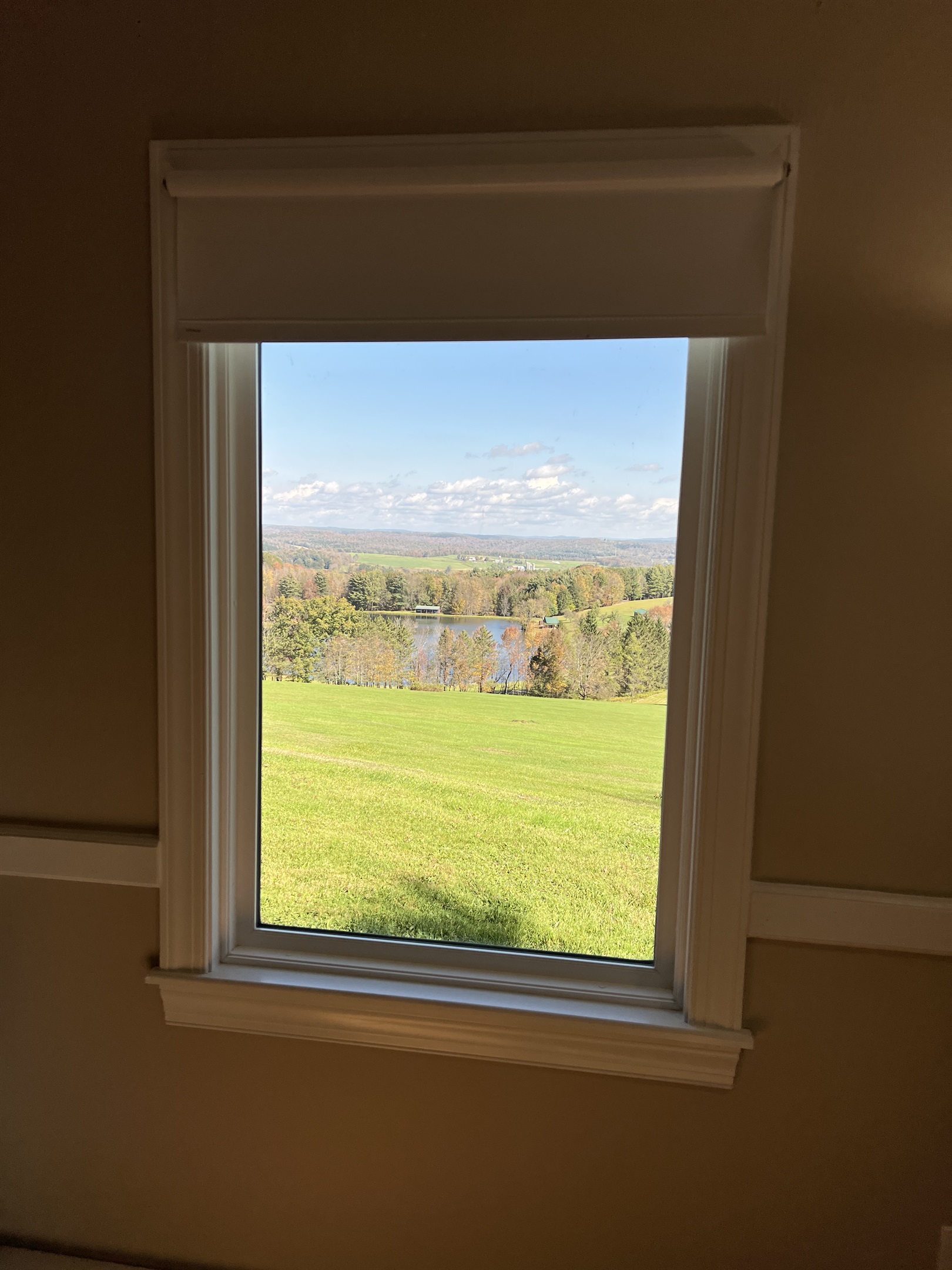 Hilltop Hideaway 1st floor King bedroom #1 with breathtaking views of the hills beyond.