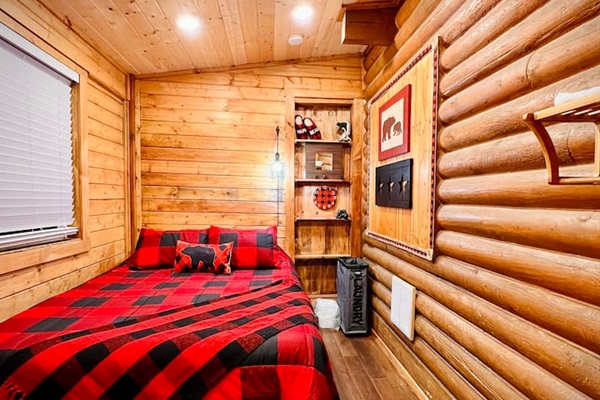 Hibernatin' Haven is located on the main floor and accommodates 2 with a queen size bed.
