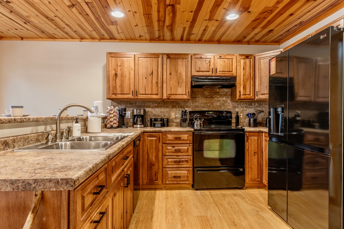 Kitchen equipped with all your essentials, including coffee, tea, sugar and coffee pods for those one cup coffee drinkers.