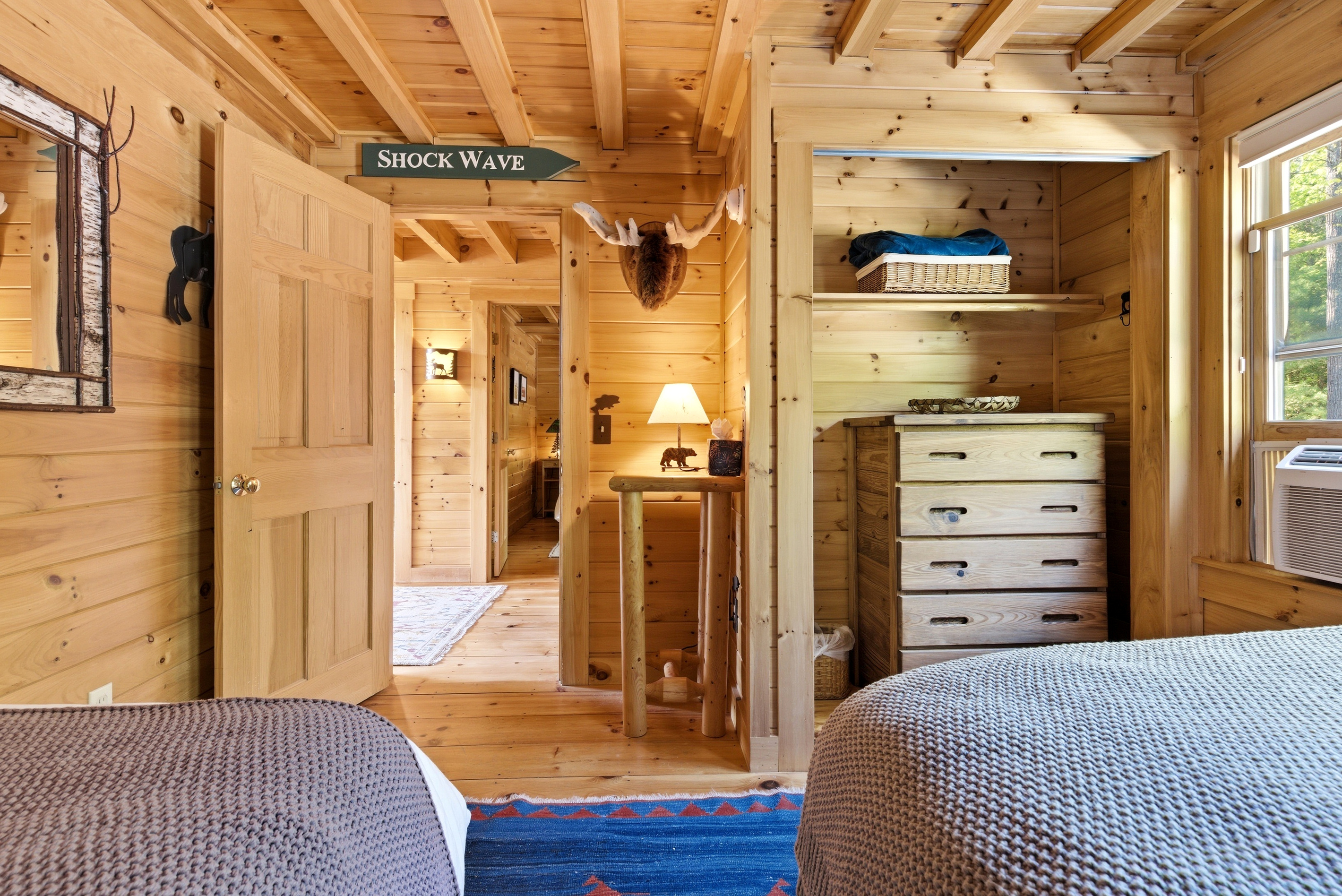 Convenient storage and rustic cabin details help make longer stays feel right at home.
