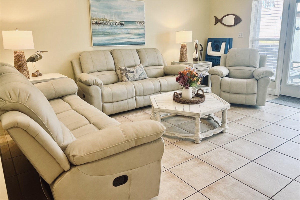 New furniture for 115! Both couches are recliners on both ends plus a big comfy recliner! Same great pool and courtyard views!