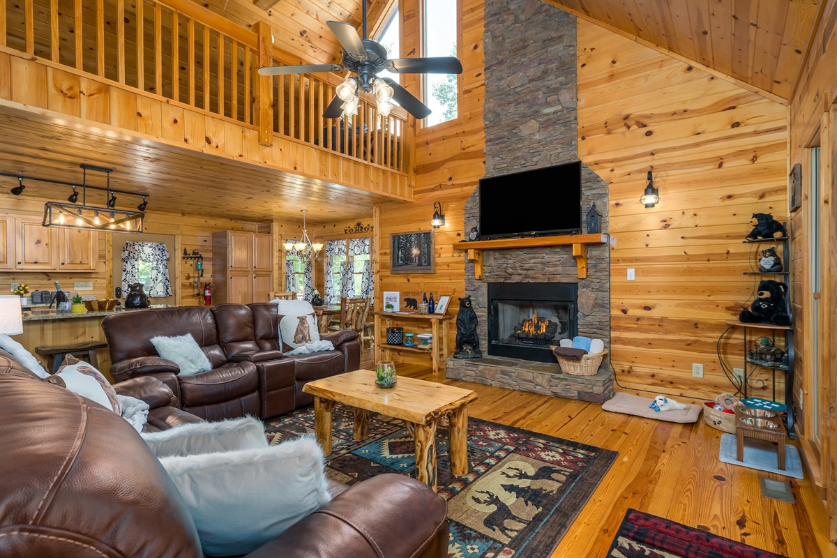 Comfy leather seating for a relaxing movie night, deeply snuggled into blankets and surrounded by crackling fire.