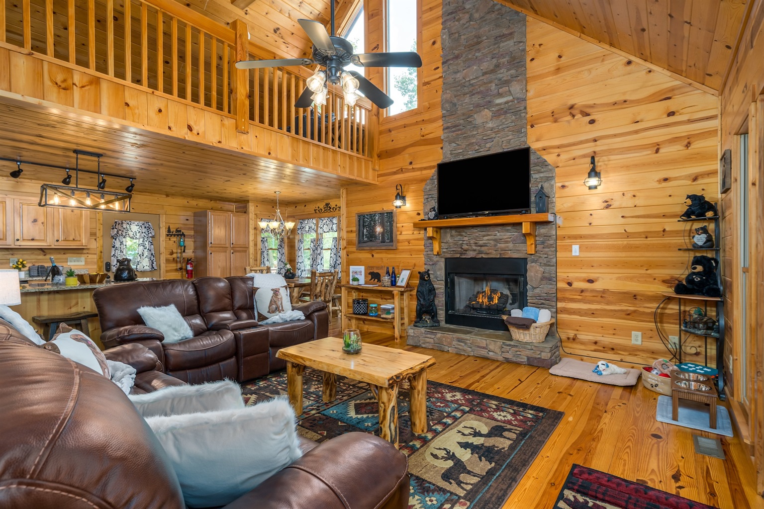 Comfy leather seating for a relaxing movie night, deeply snuggled into blankets and surrounded by crackling fire.