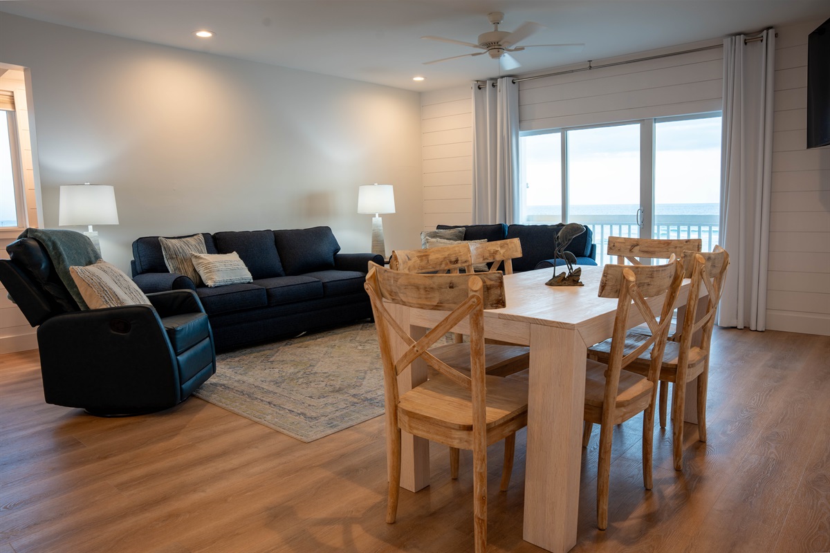 Comfortable living area with Queen sleeper sofa. Dining area seats 6.