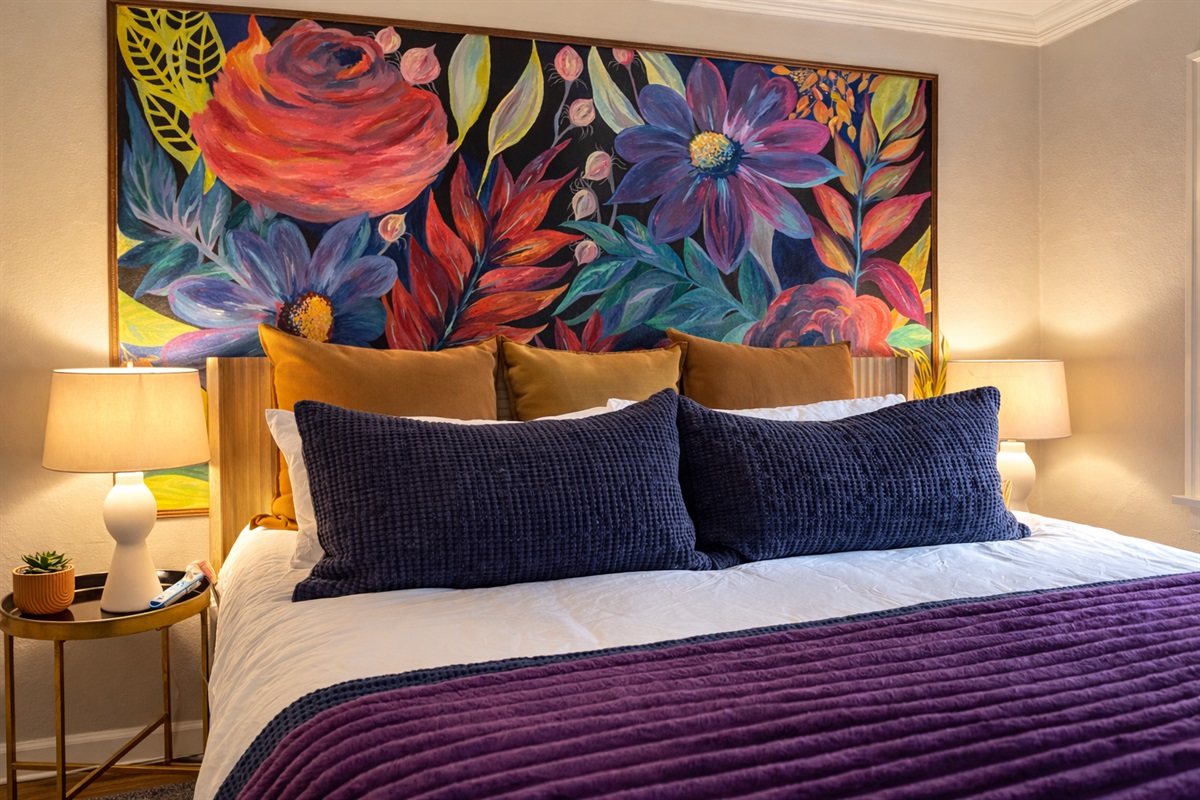 Bedroom #1 of 3: King bed with backyard views