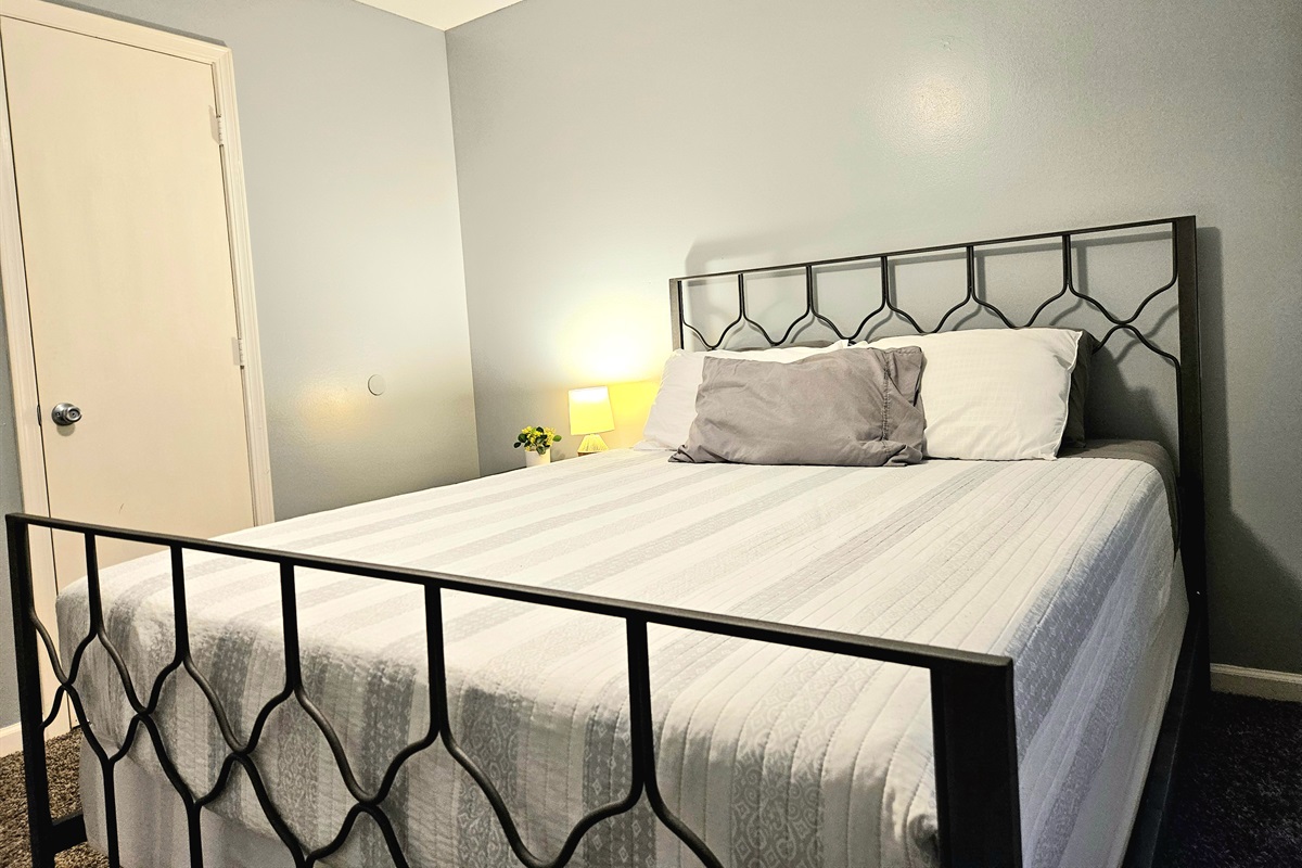 Guest room with memory foam mattress and plenty of natural light. Boasts a new ceiling fan and high speed internet. Optional rollaway bed included.