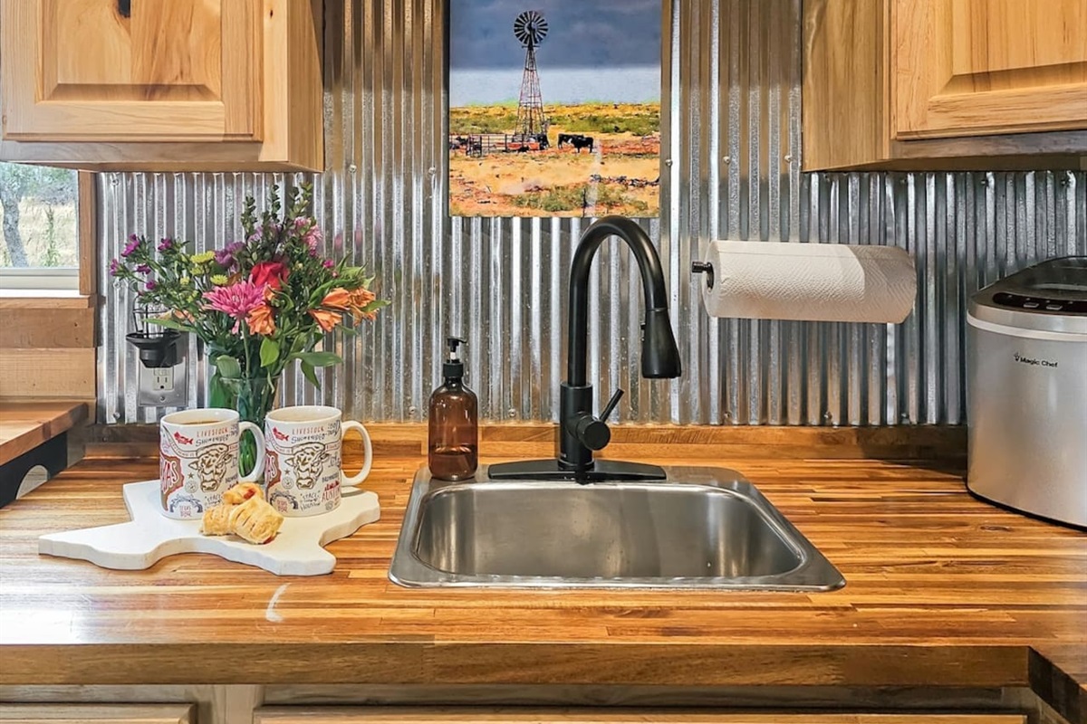 A cozy nook to refresh and relax, complete with thoughtful details and a touch of Hill Country charm.