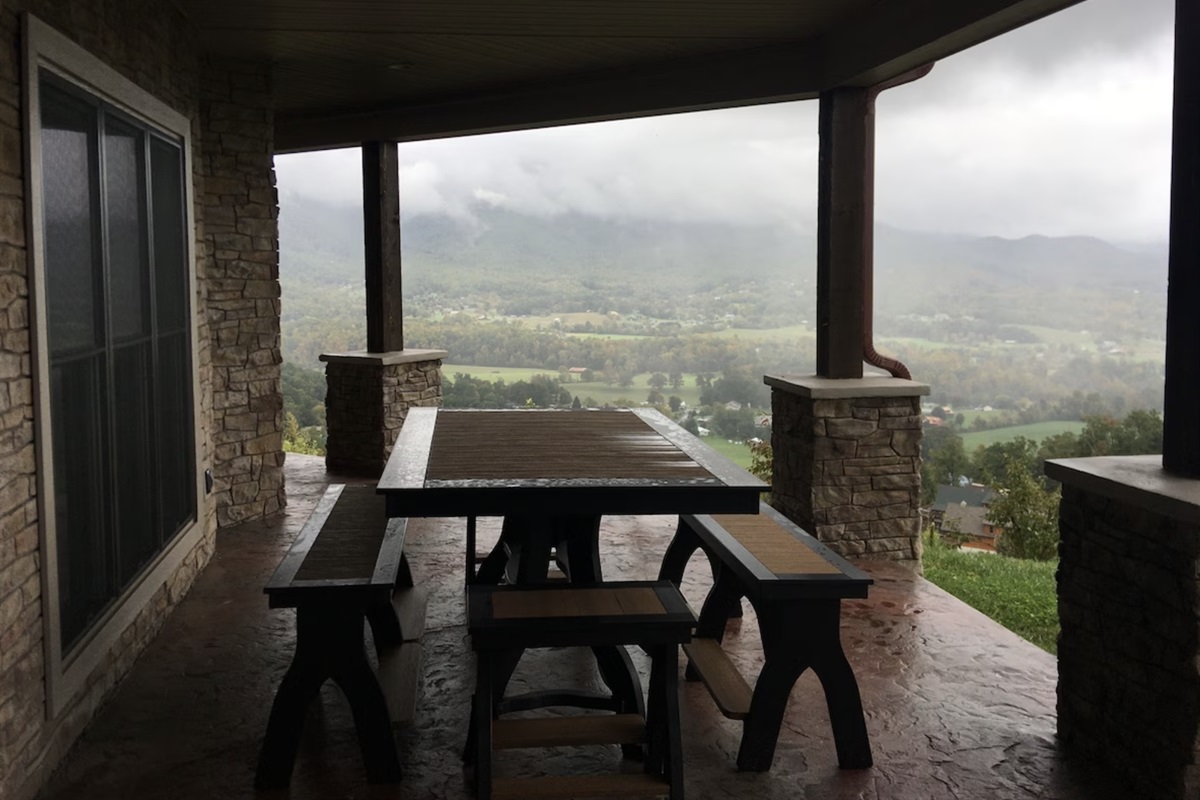 The patio wraps around the side of the Chalet, with seating for midday snacks or meals outside (When the weather permits!)