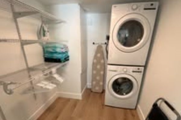 Master bedroom closet with washer & dryer