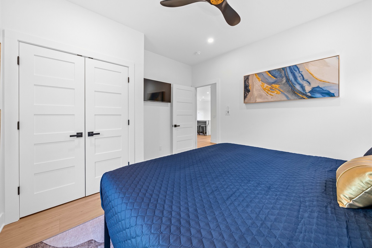 A beautiful king-sized bedroom with a view. Wake up refreshed and ready to go.