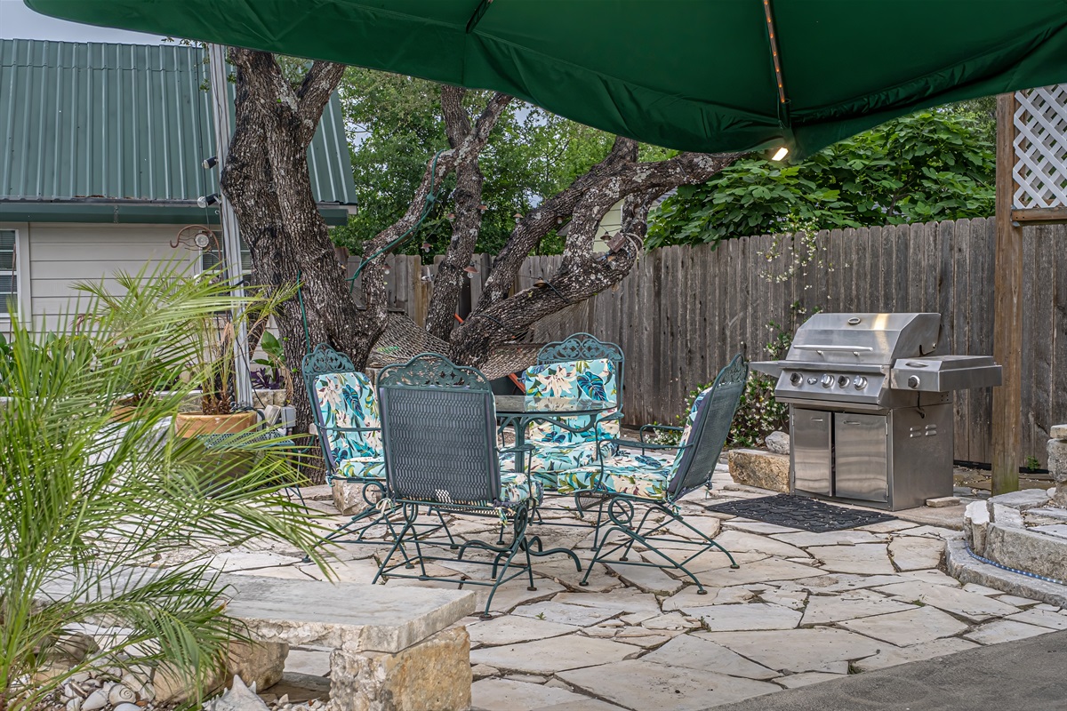 Naturally shaded patio made of Texas limestone that stays cool on hot summer days.