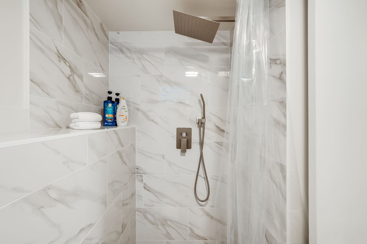 Remodeled bathroom with rain shower head!