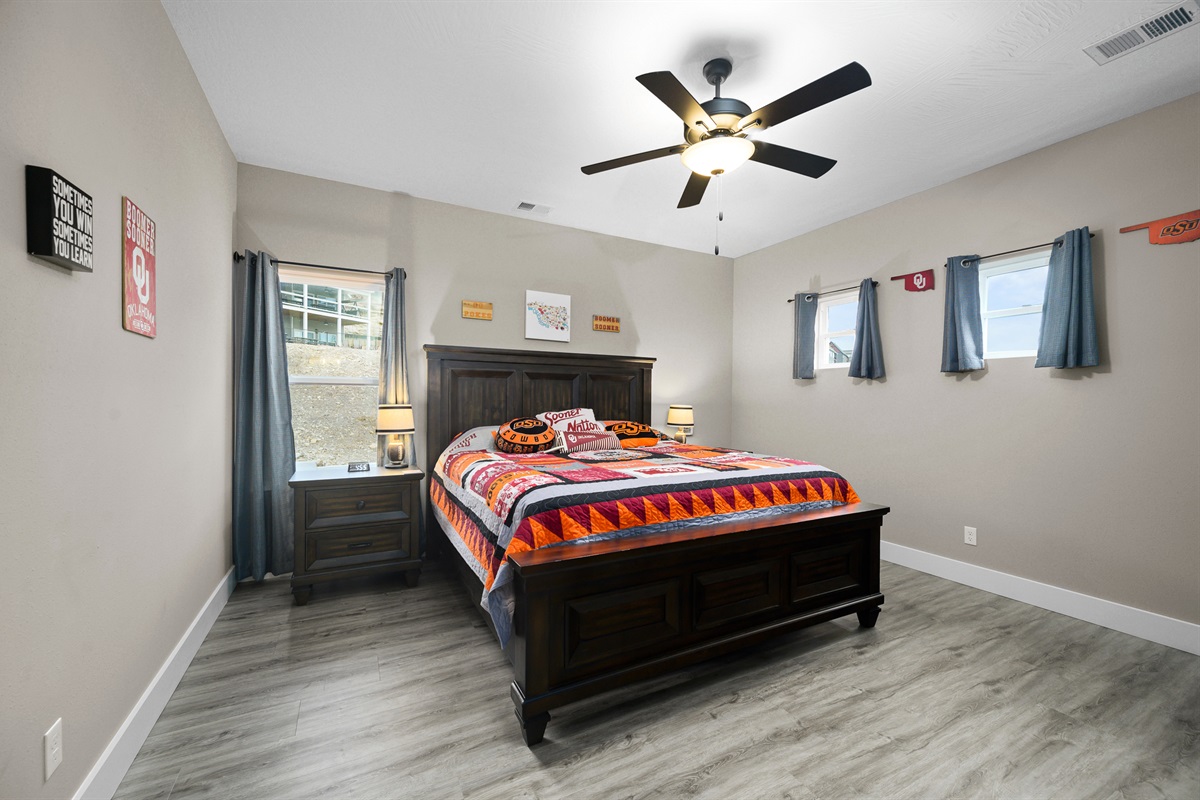 Upper level: Oklahoma room with king bed. Bathroom located in hall.