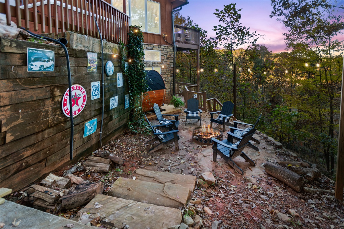 Gather ‘round the fire pit and enjoy the glow of good company under the trees.