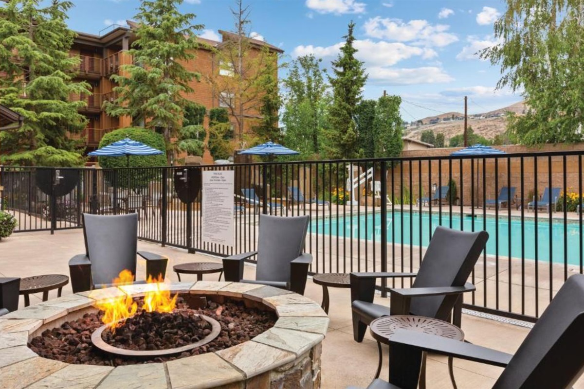 Fire table and outdoor swimming pool