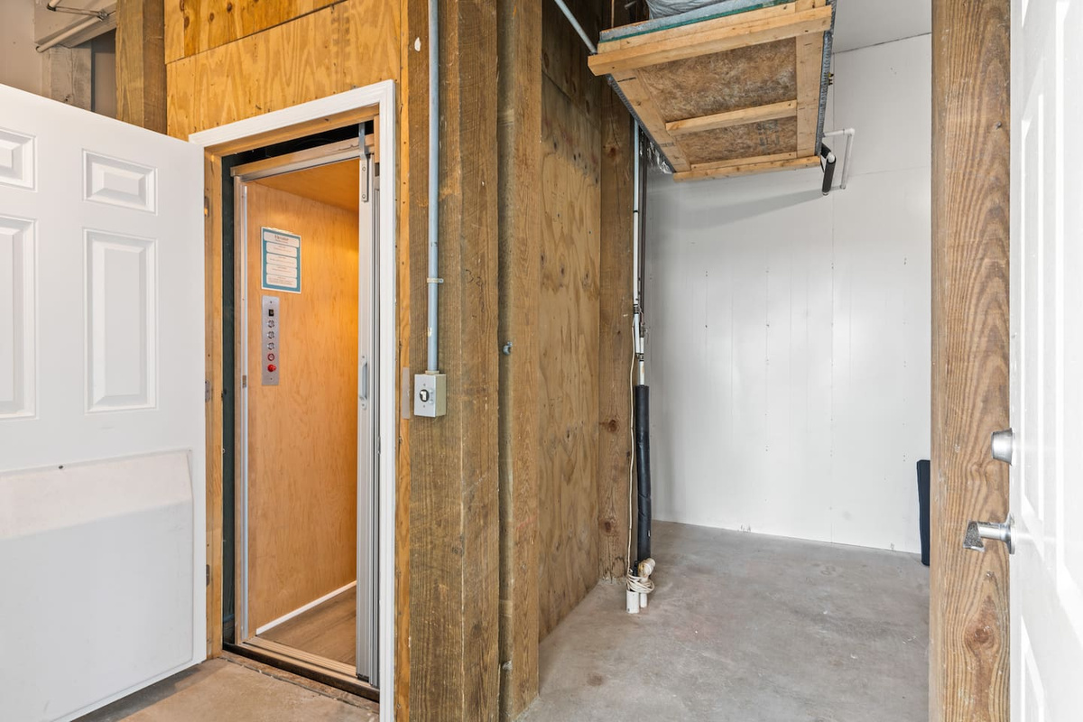 Ground Floor Elevator Access & Storage For Outdoor Amenities. 