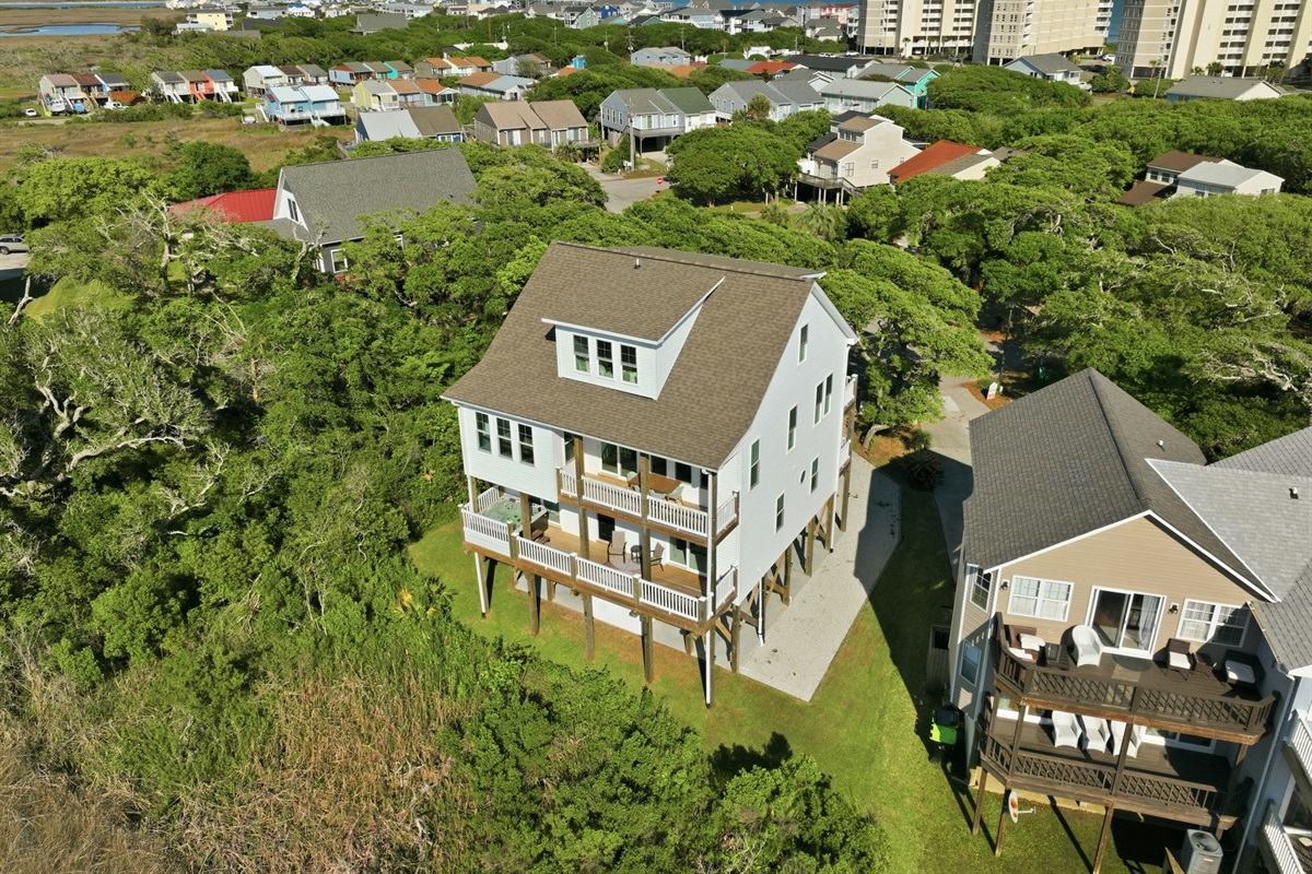 Nestled in a quiet beach community close to restaurants, shops, and the shoreline
