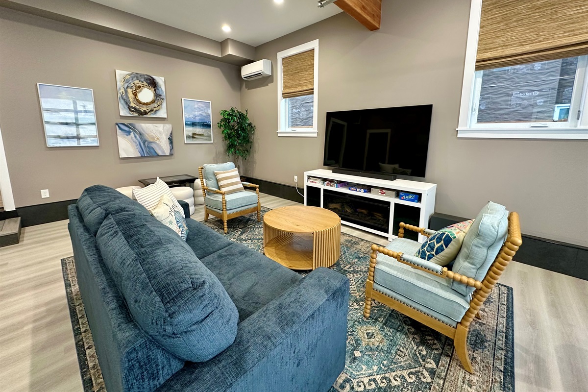 Villa B has a full casual downstairs with a 75-inch theater, Infinity Game Table, air hockey, and room to spread out.