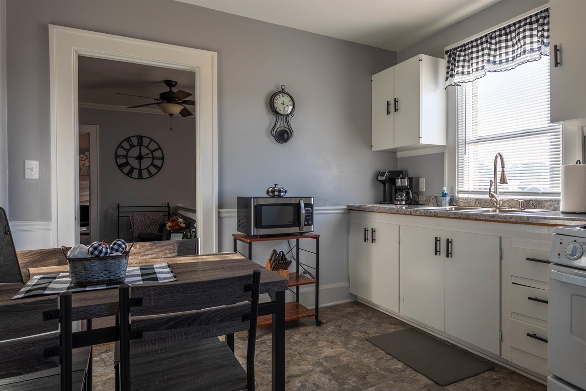 Enjoy meals at the dining table located right inside the eat‑in kitchen.