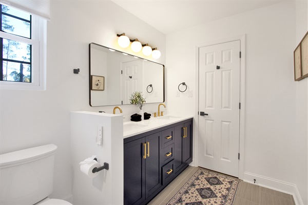 The master bathroom, which includes a walk-in closet, is designed with privacy as the top priority.
