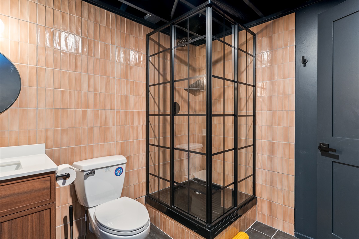 Sleek, spa-inspired shower with modern finishes and a clean, upscale feel—perfect for unwinding after a day exploring the Finger Lakes