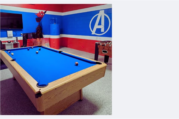 Play a game of pool in the Avengers Game Room!