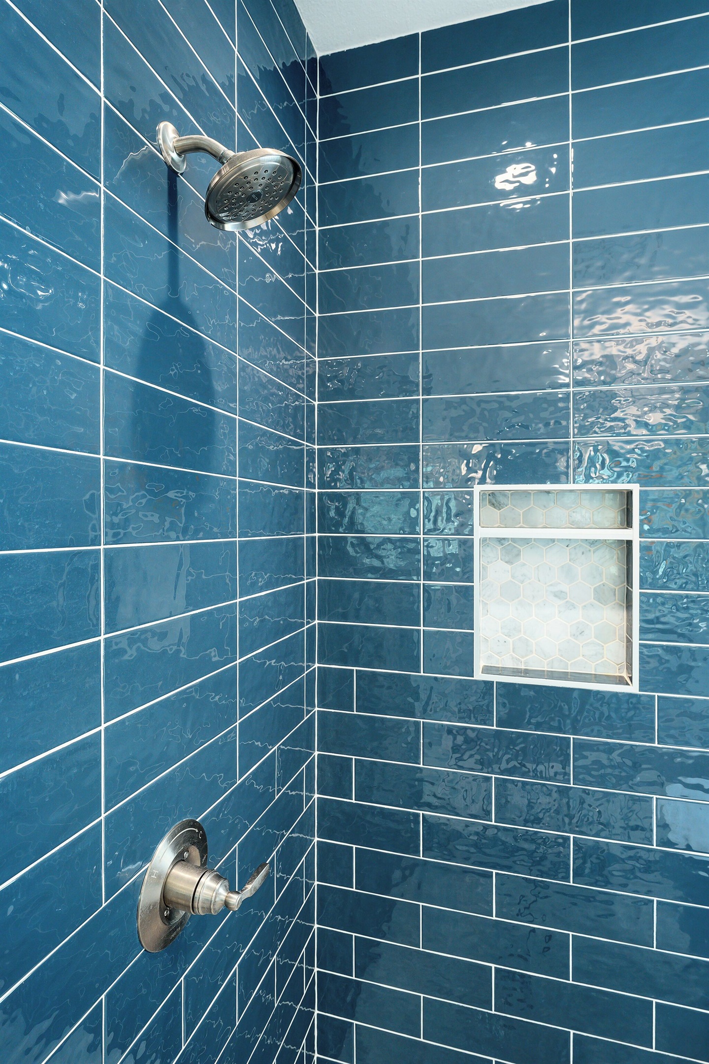 Primary bathroom with stand up shower, double sinks, and soaking tub