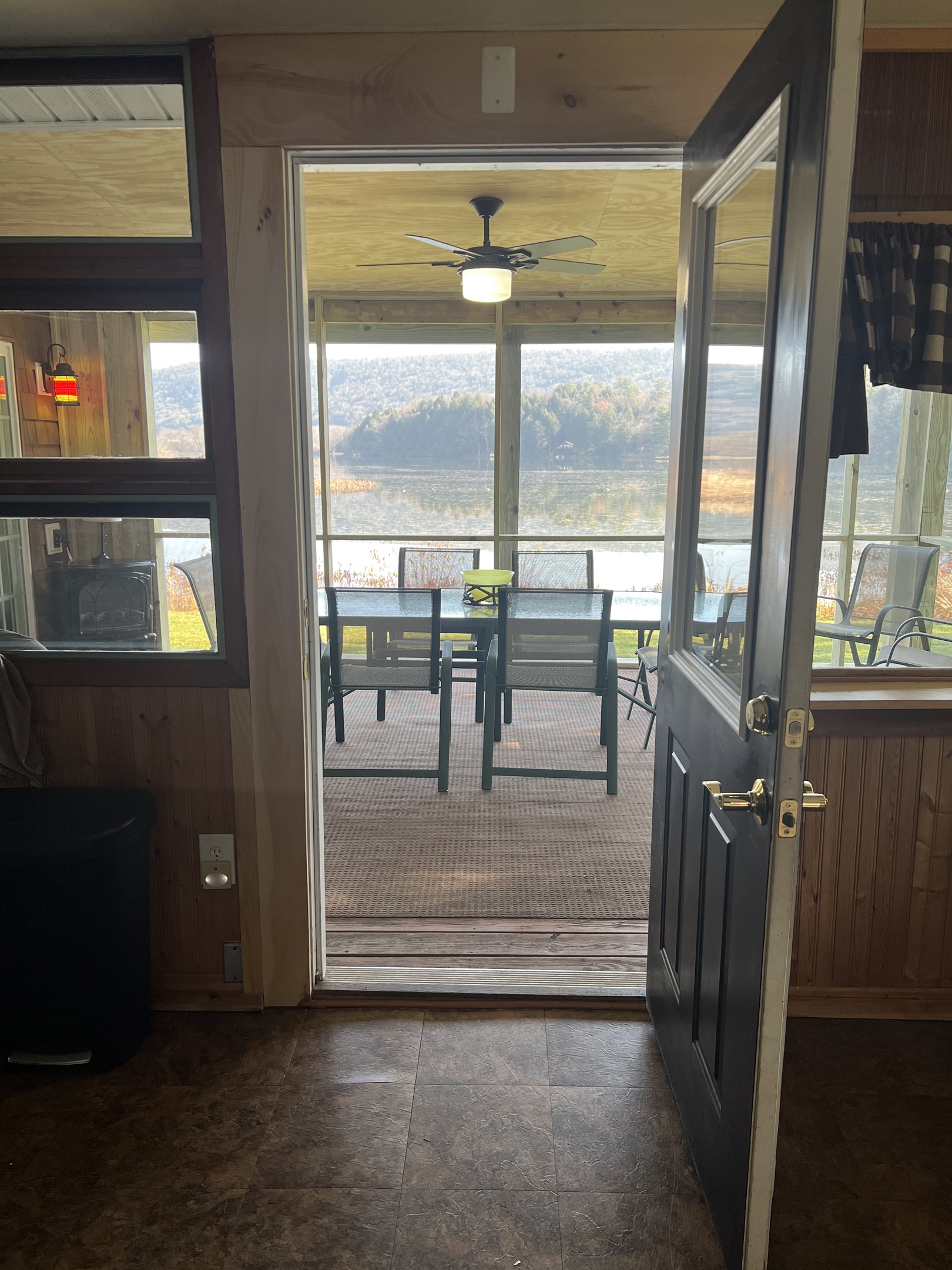 Nature's Hidden Treasure entrance from the kitchen onto to the screened in porch.