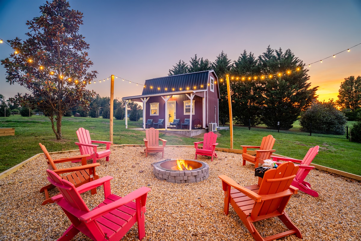 Relax around the firepit with Adirondack seating, mountain views, and unforgettable sunsets.
