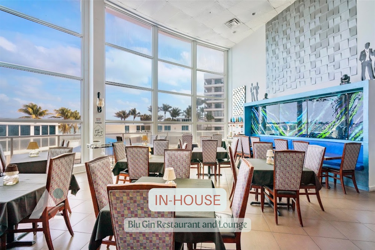 Blu Gin Restaurant & Lounge is situated on the lower level of the Castle Beach Club building, offering convenient access for guests. The venue features an extensive menu serving breakfast platters, sandwiches, pasta dishes, steaks, and craft cocktails. 