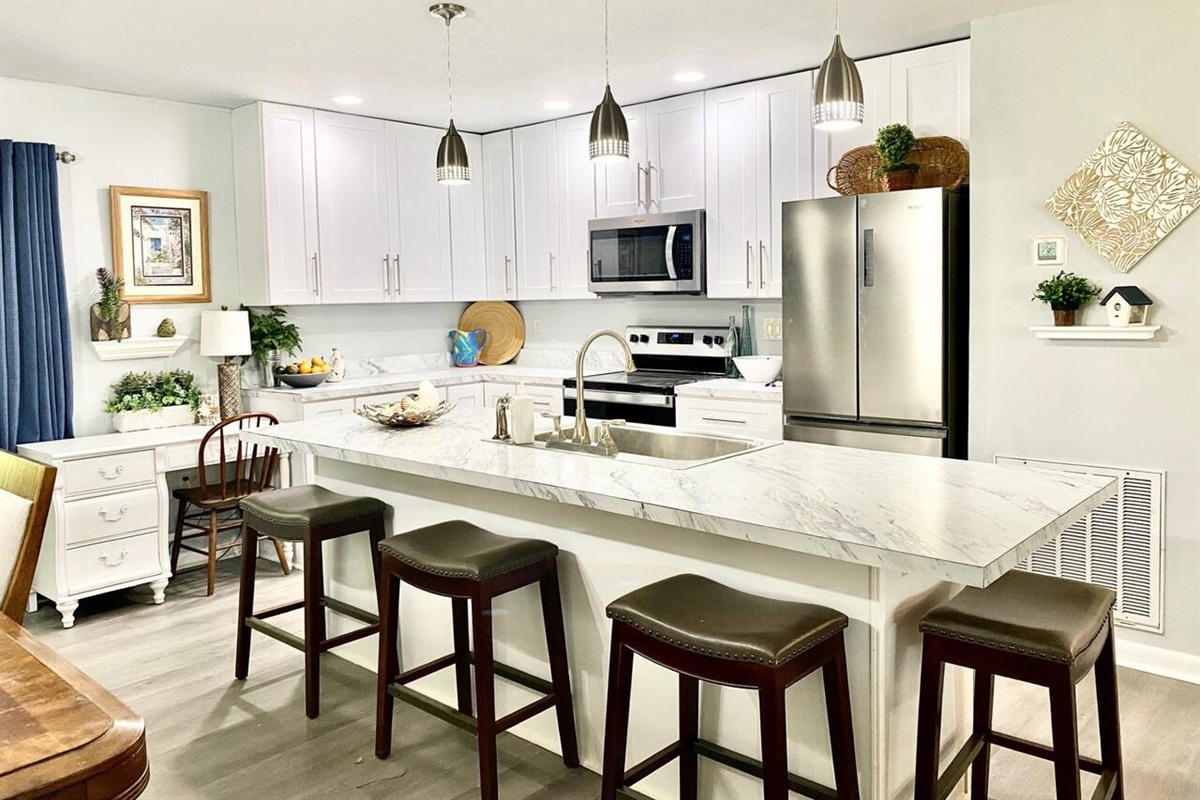 A great open concept updated kitchen to gather with your group and enjoy meals!