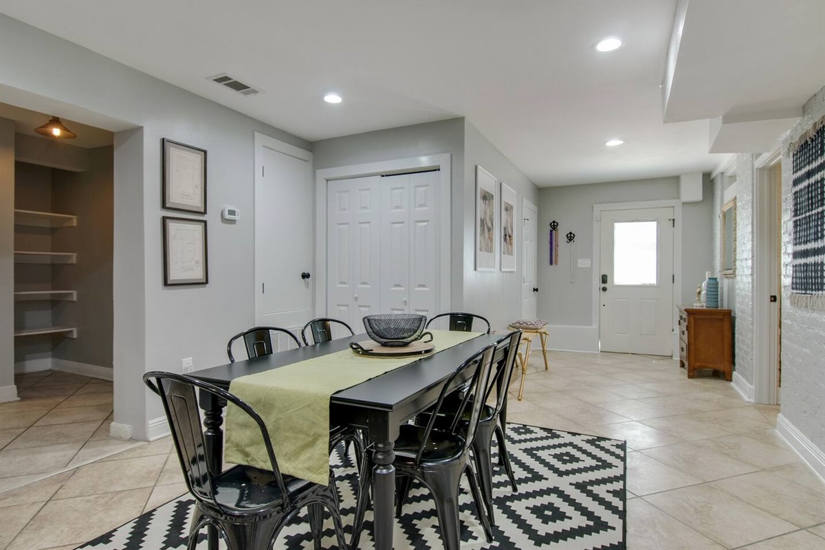 Dining area and view of front entry.