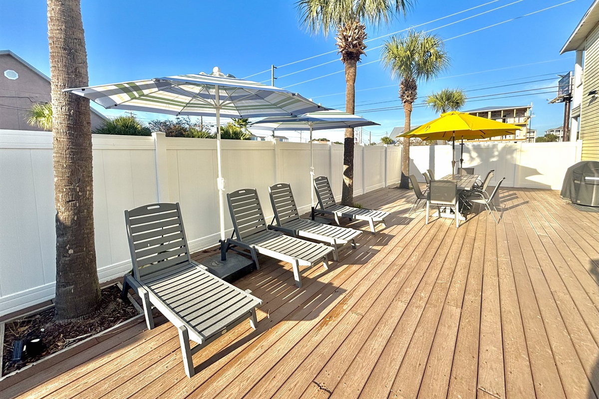 Large deck space with lounge chairs