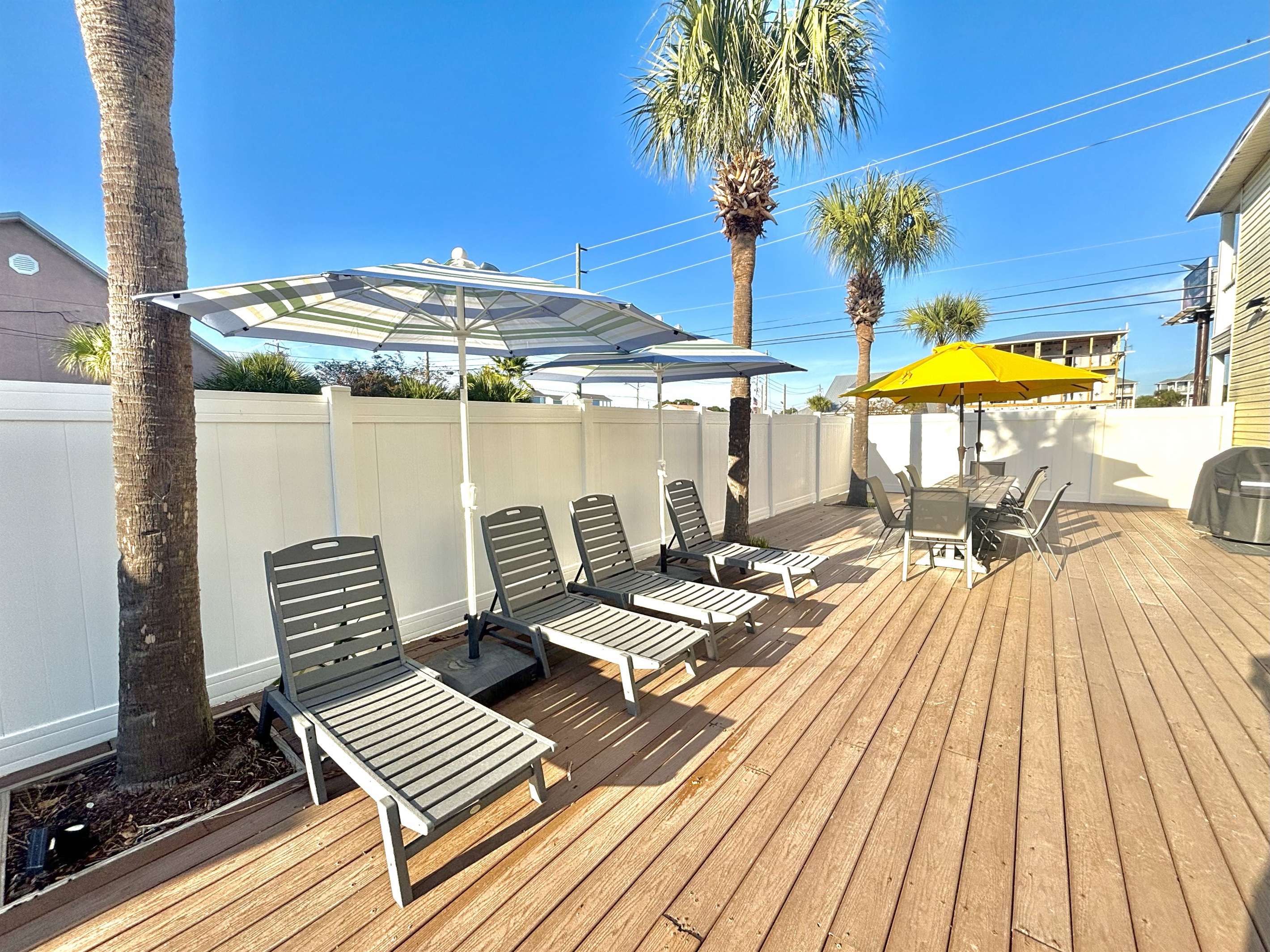 Large deck space with lounge chairs