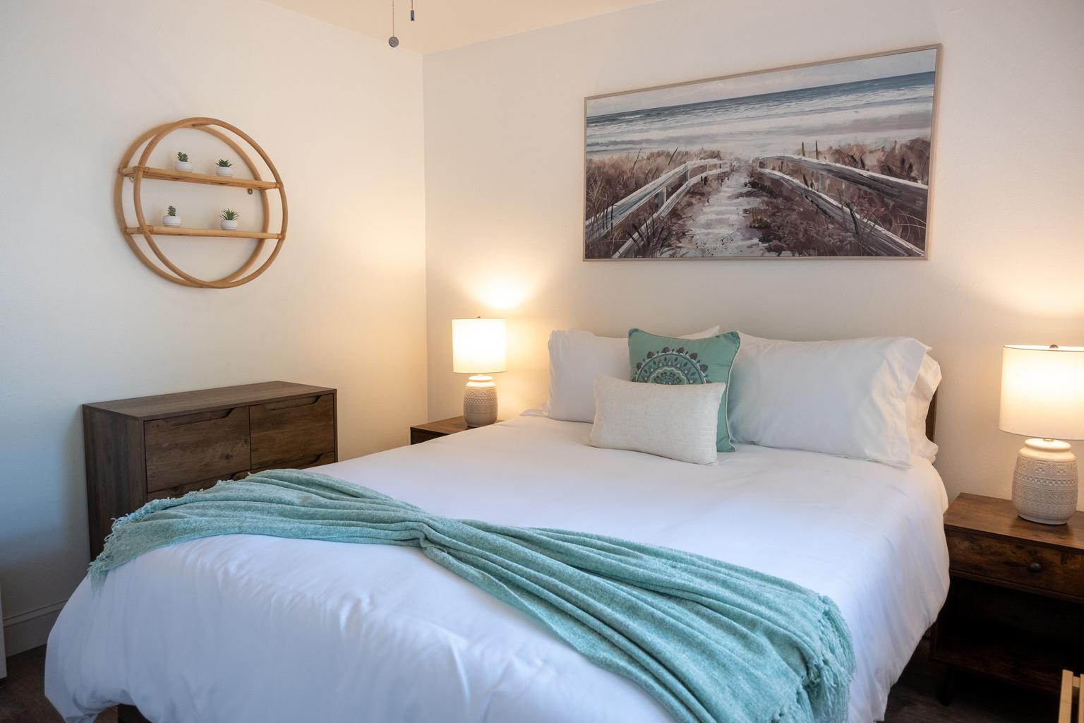 Bedroom 2: cozy queen with soft coastal tones