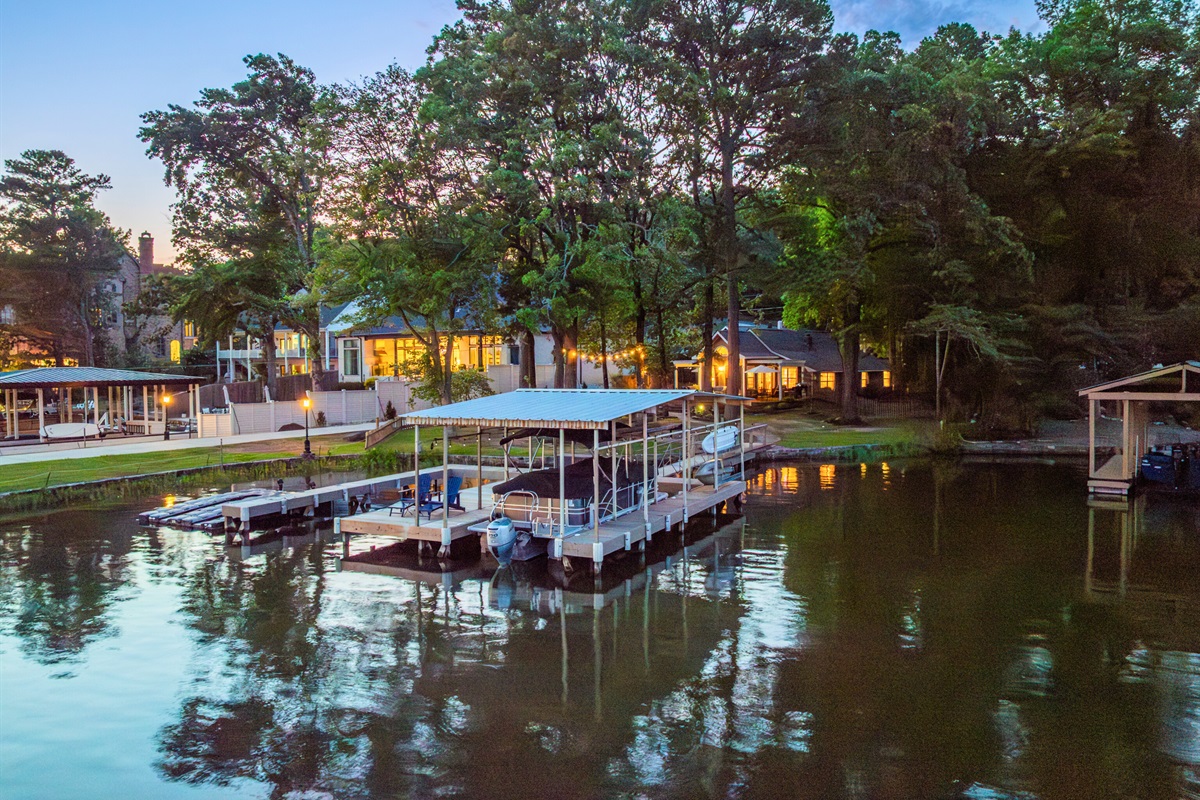 A peaceful cove surrounded by trees and glowing lights. It’s the sweet spot where relaxation meets nature.