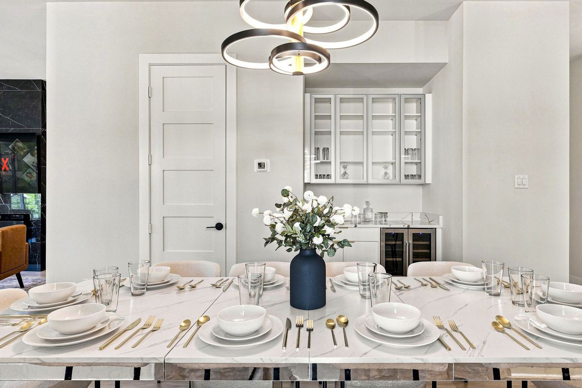 Gather around the elegant marble table and savor unforgettable meals with friends!
