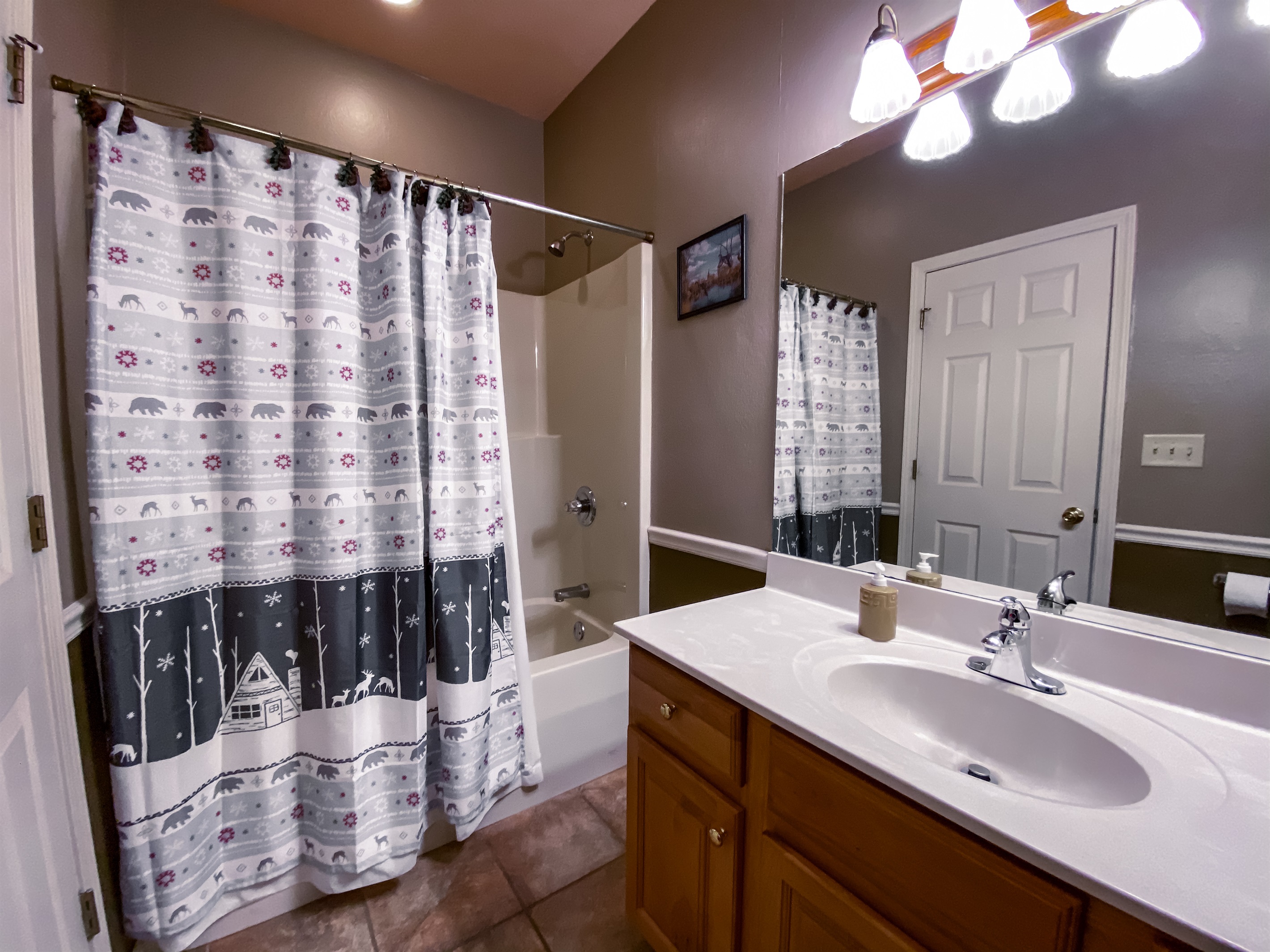 Bathroom 3 is an ensuite in bedroom 3 on mid-level