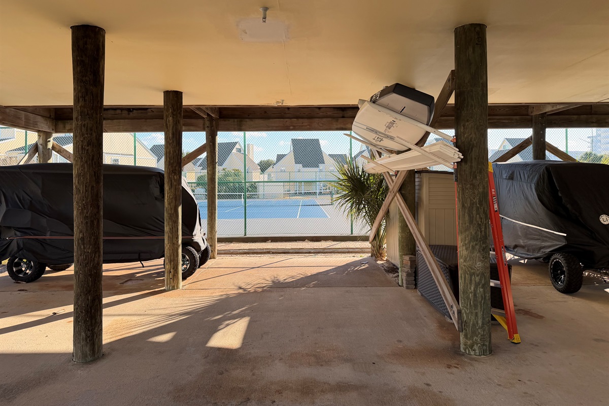 View of the private parking area under the condo, which is also where a boat can be parked.