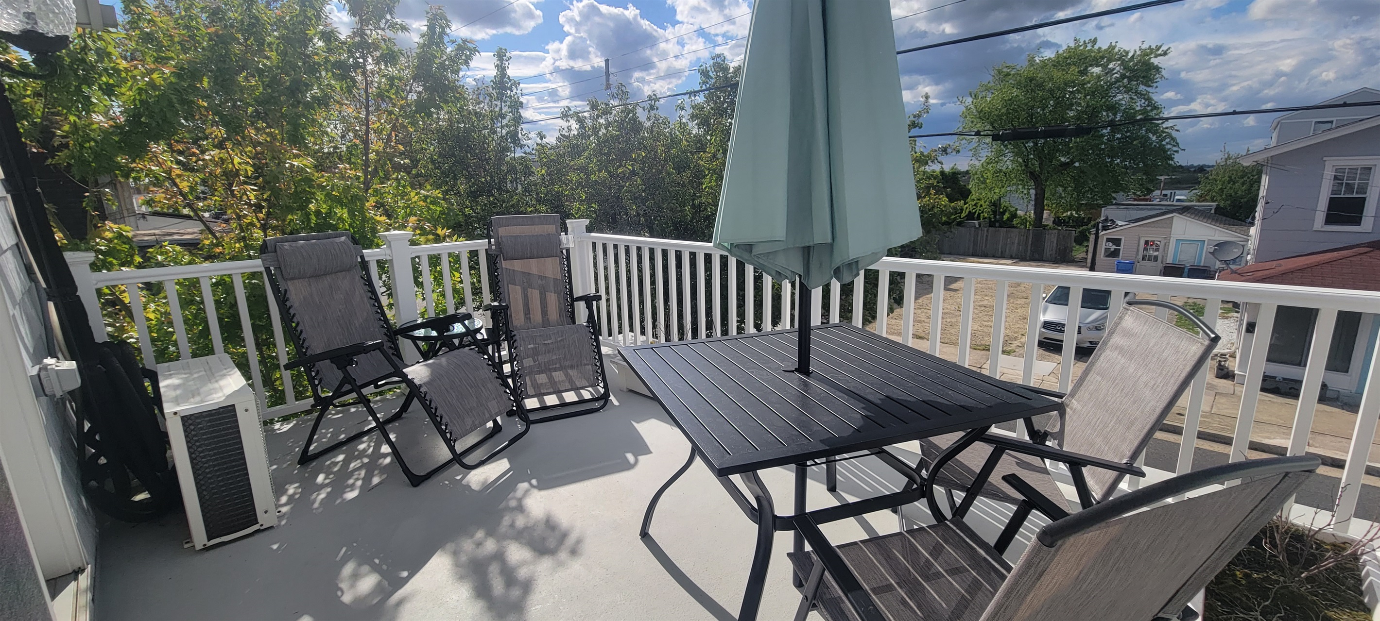 Hang out and catch a sunset on the second floor balcony with a view of the bay.