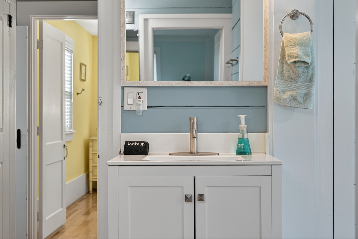 Clean and modern bathroom vanity with ample counter space and storage for your essentials.