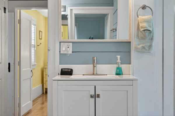 Clean and modern bathroom vanity with ample counter space and storage for your essentials.
