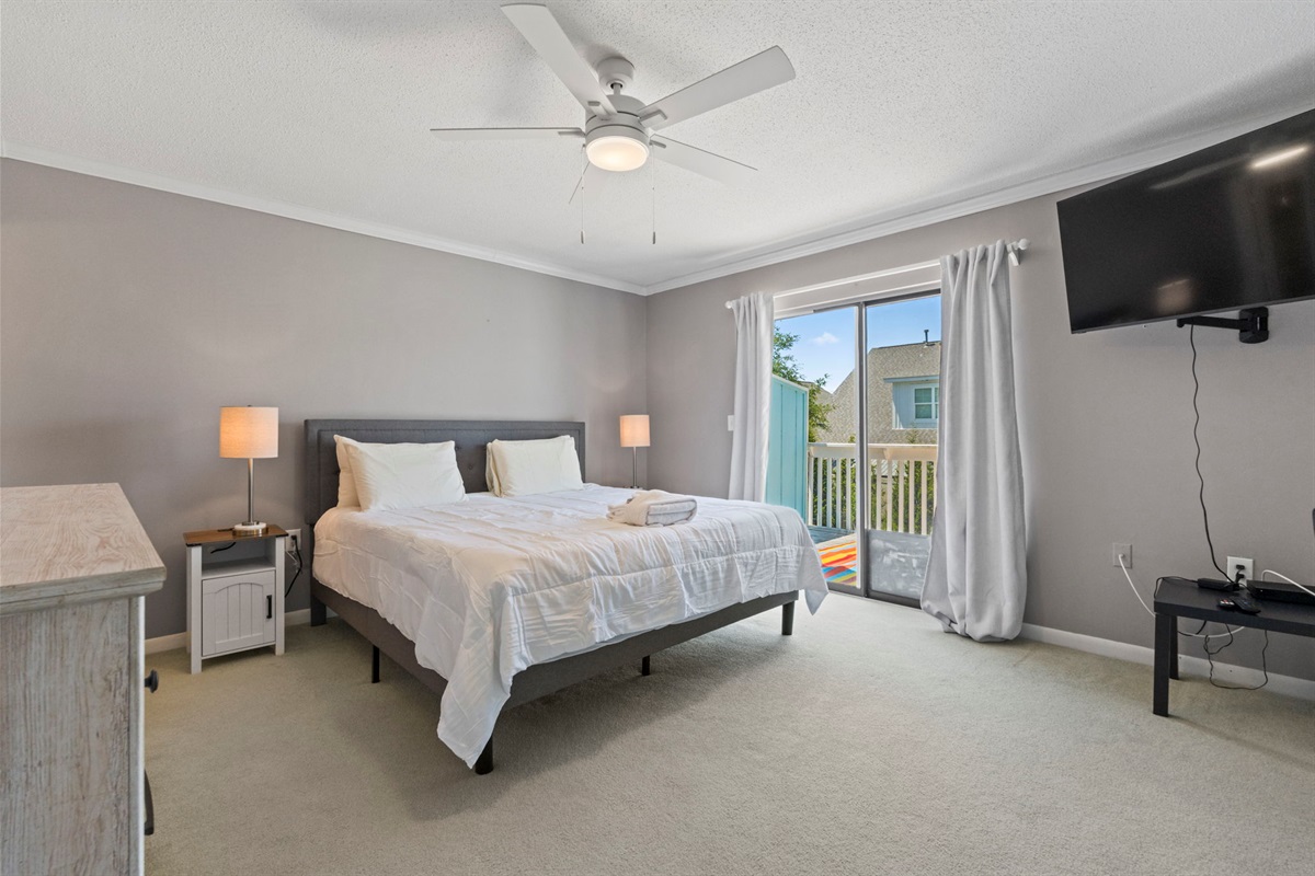 Primary Bedroom with King Bed, Smart TV & Ensuite Bathroom and Balcony
