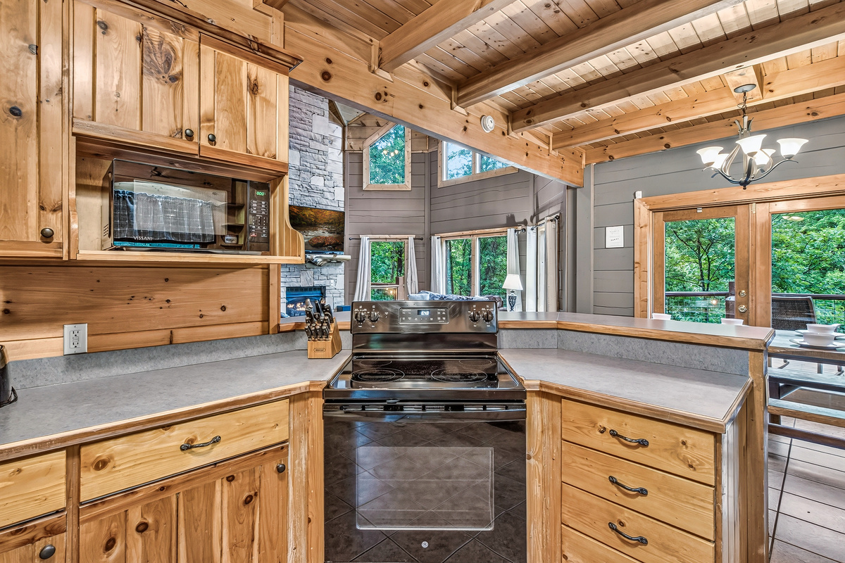 Cook with a view of the main living area and deck, ensuring you never miss a moment of the conversation.