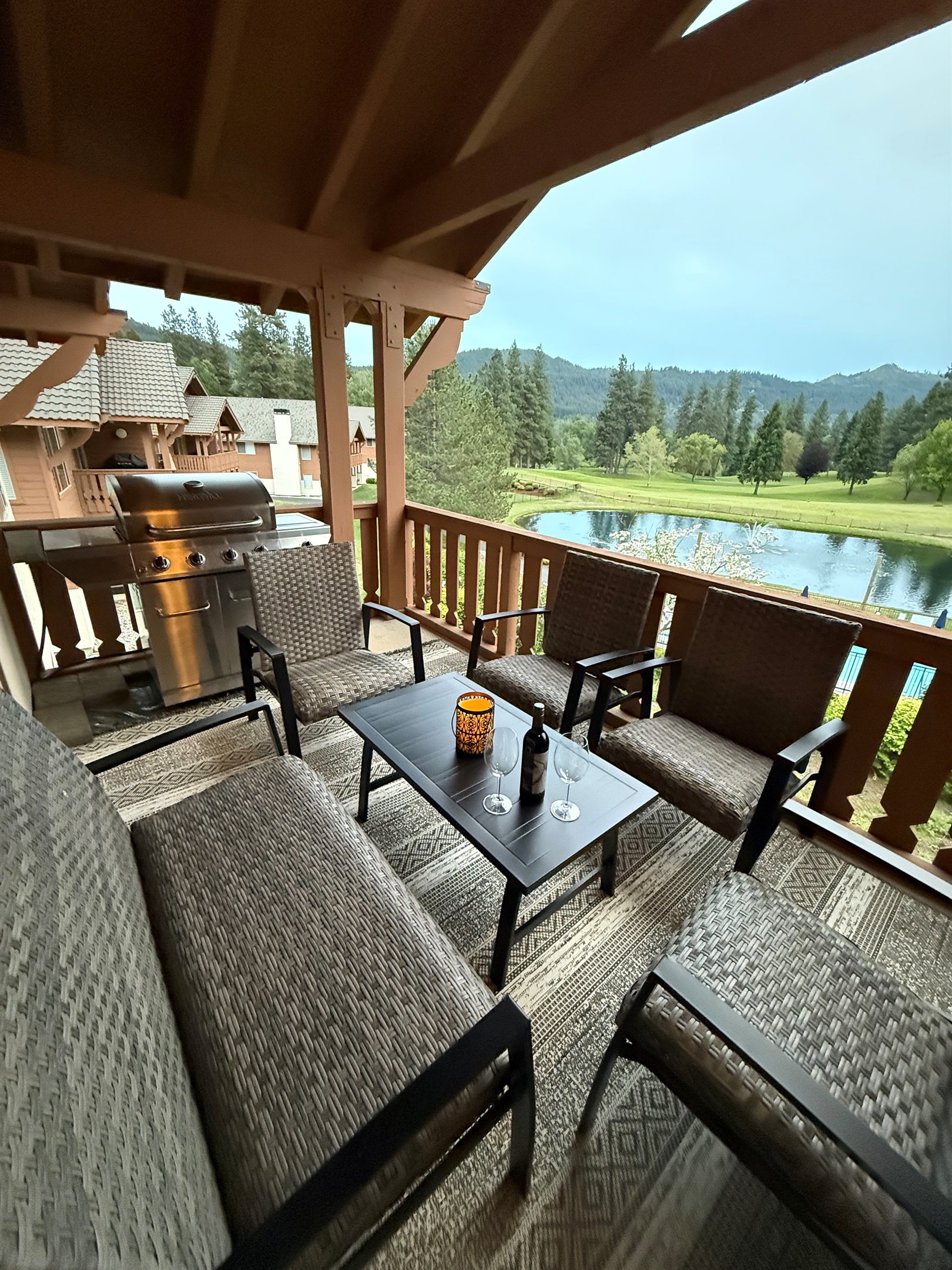 Barbecue while you enjoy the views from the balcony of the golf course, pond, and pool