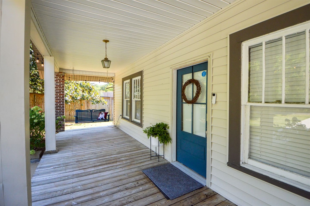 Front porch side view and porch swing