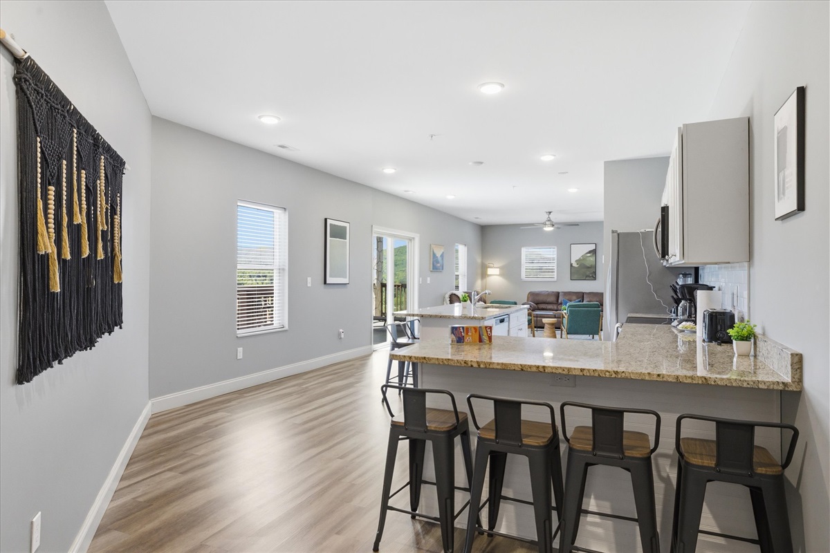 Step inside Unit 3 and notice the difference—the longer entry opens things up right away, leading you into a more spacious kitchen and living area that feels easy to settle into.