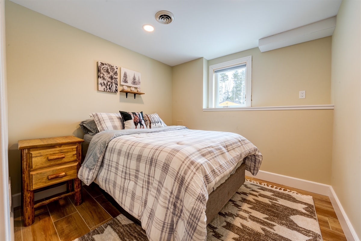 Bedroom 3 on the bottom floor with Queen bed