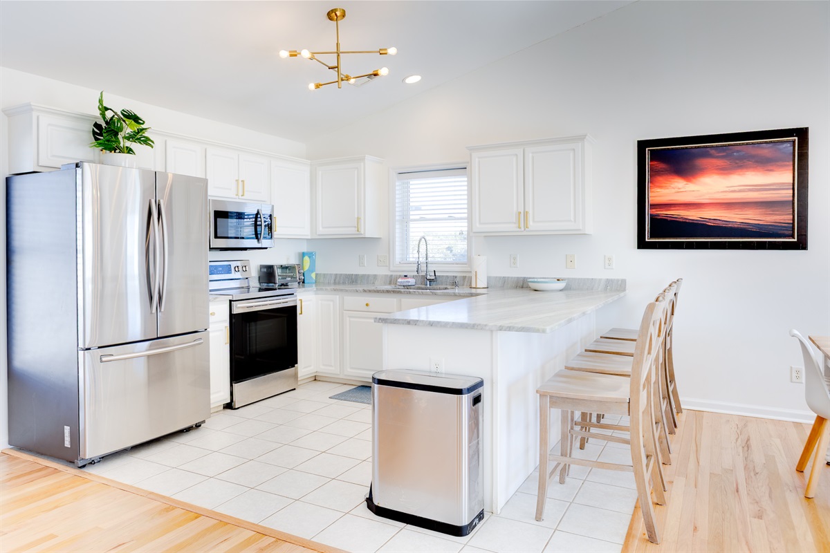 Bright, modern kitchen with a spacious island&mdash;perfect for cooking, gathering, and morning coffee!